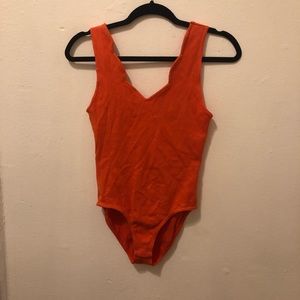 Vintage body suit with scalloped neck line